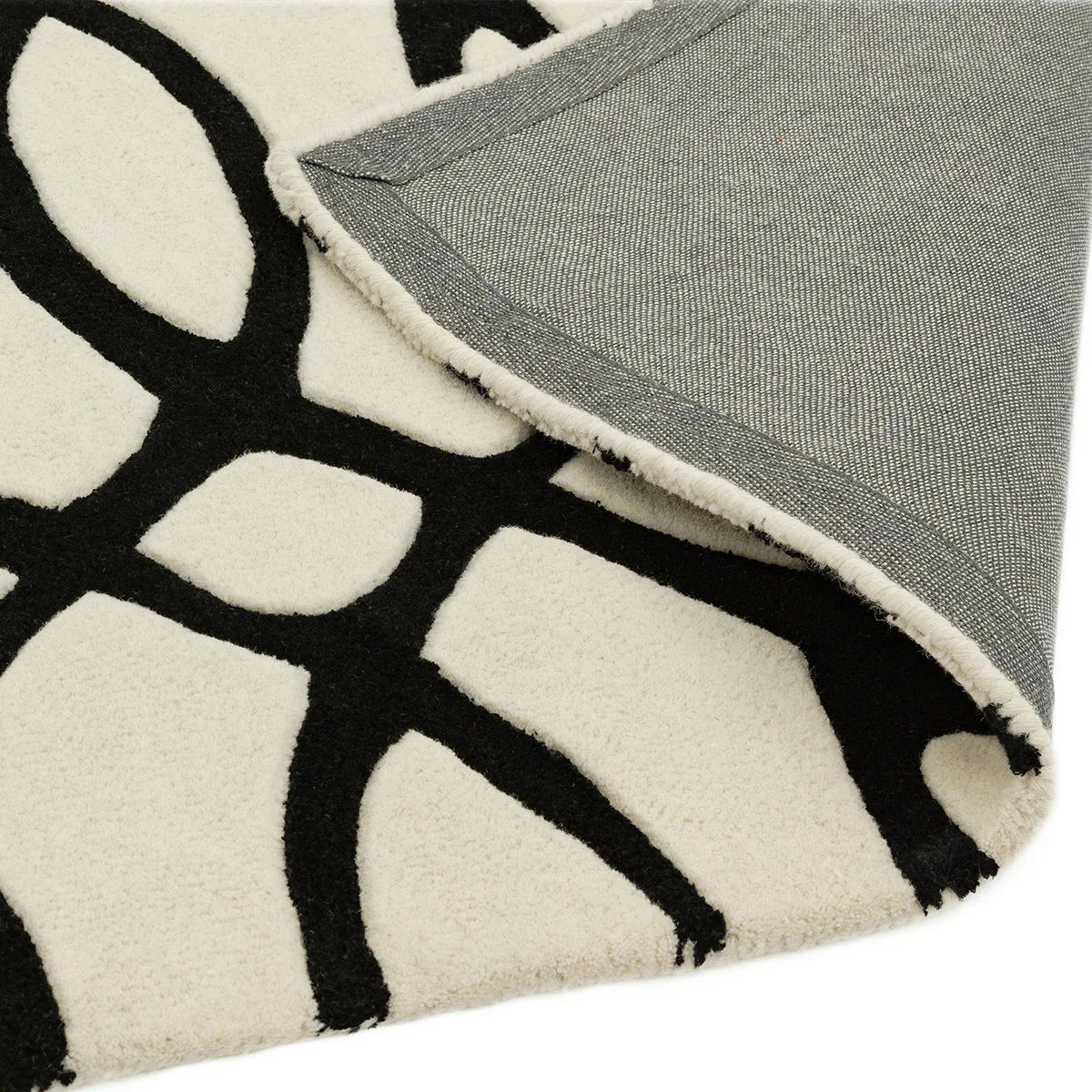 Asiatic Matrix Max Wire White Designer Rug featuring abstract geometric black pattern on cream background, hand-tufted wool