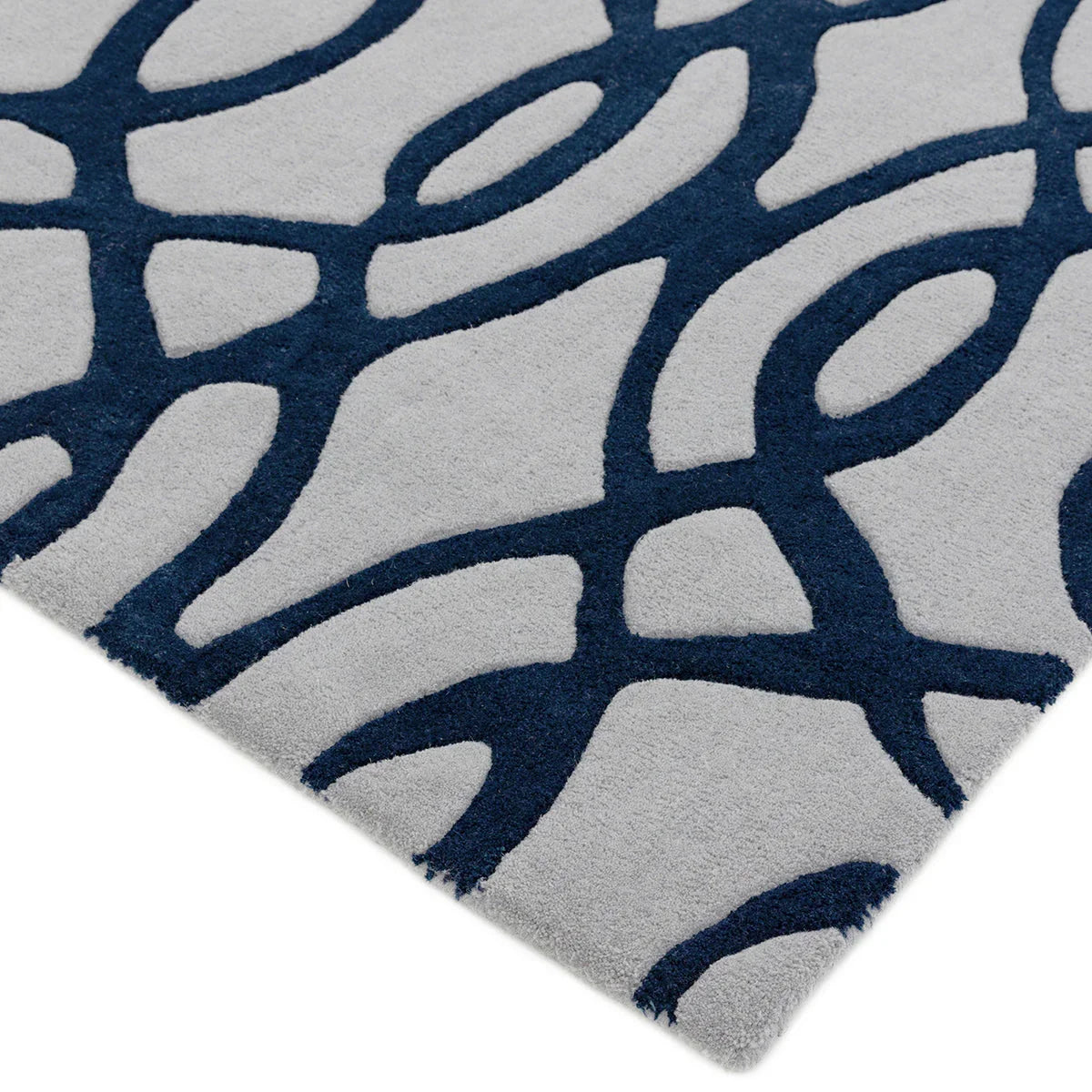 Asiatic Matrix Max Wire Blue Designer Rug featuring abstract curved-line pattern in navy blue and light grey on pale grey background, machine-made polypropylene