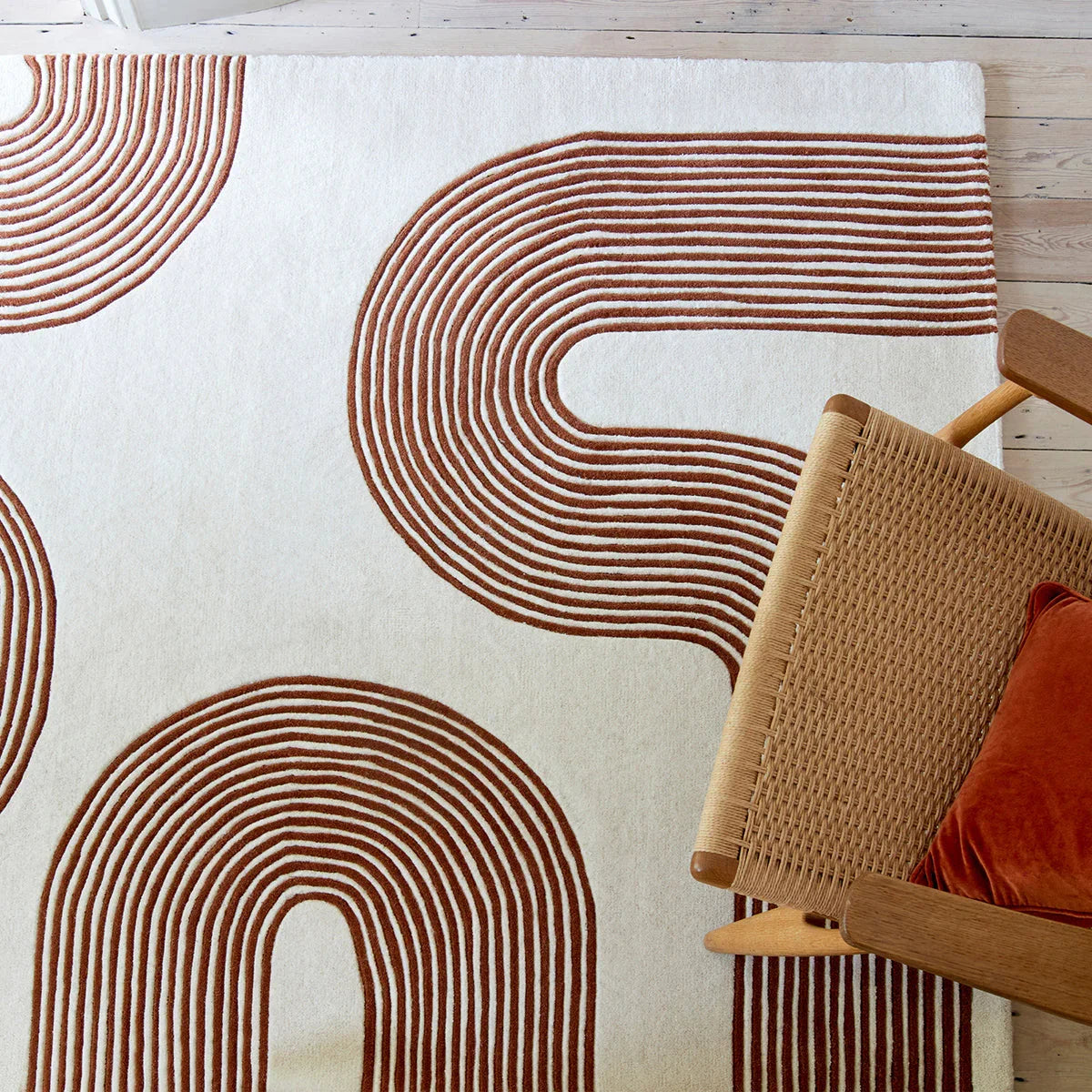 Asiatic Matrix 85 Arches Amber Rug featuring arch-lined pattern in amber brown on cream background, hand-tufted wool