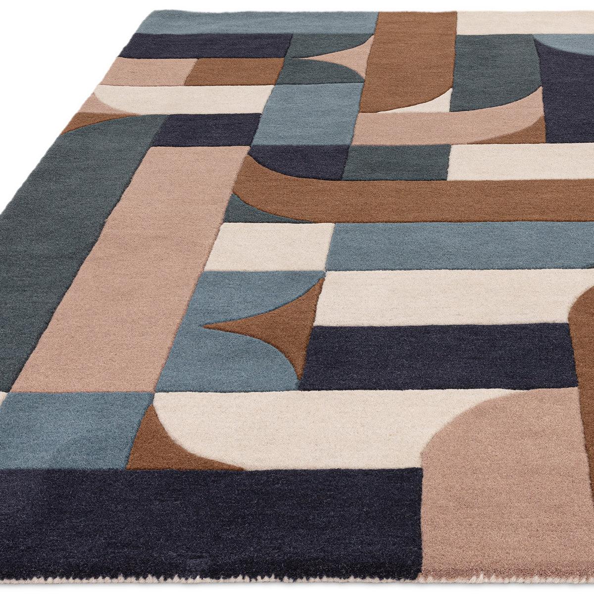 Asiatic Matrix 89 Klotski Teal Rug featuring geometric blocks in teal, navy, cream and brown on ivory background, machine-woven wool
