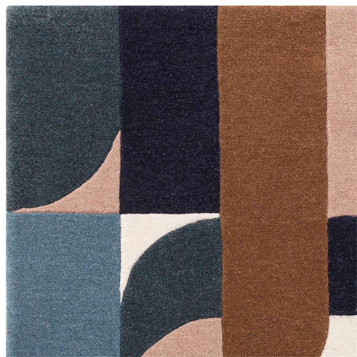 Asiatic Matrix 89 Klotski Teal Rug featuring geometric blocks in teal, navy, brown and beige on cream background, hand-tufted wool