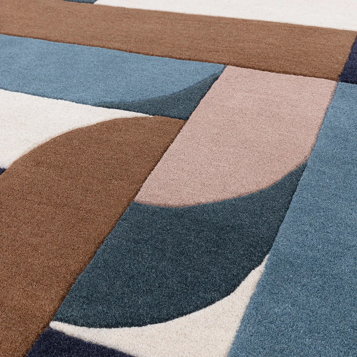Asiatic Matrix 89 Klotski Teal Rug with abstract geometric blocks in teal, dusty blue, brown and cream on ivory background, hand-tufted wool