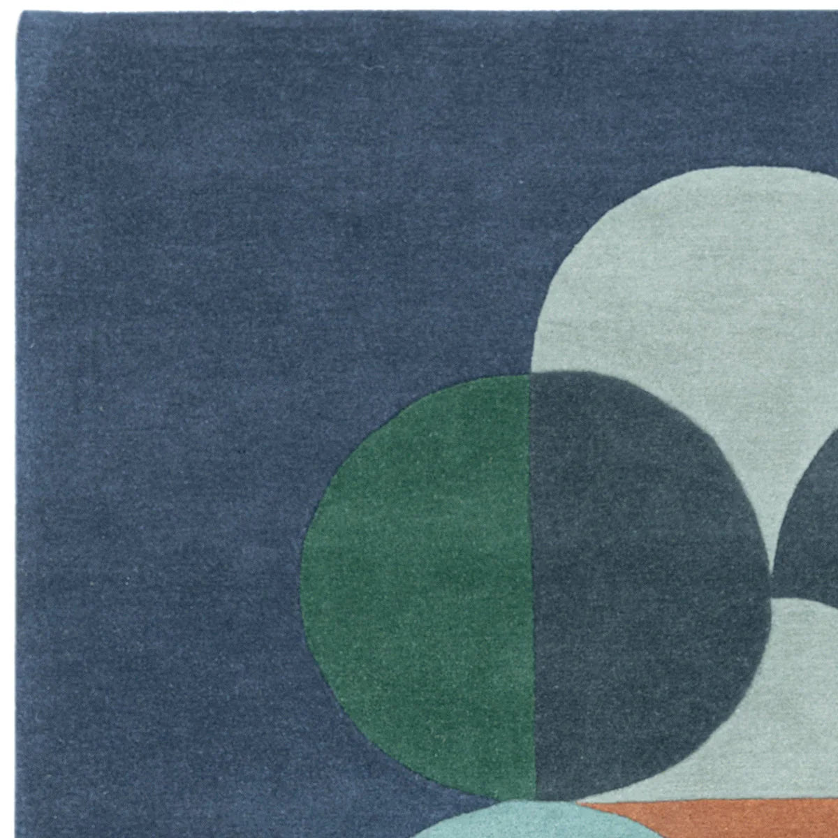 Asiatic Matrix 91 Statement Rug featuring abstract geometric pattern in navy, emerald green, teal and light grey on navy background