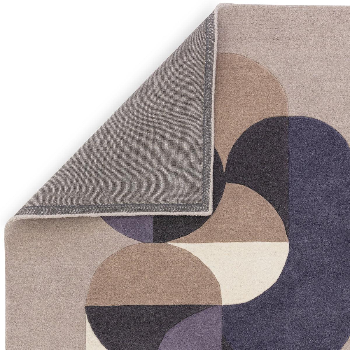 Asiatic Matrix 92 Statement Grey Rug featuring geometric circular motif in beige, taupe, navy and lilac on cream, hand-tufted wool