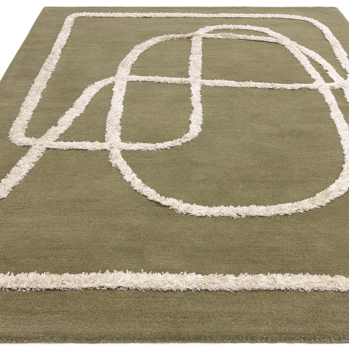 Asiatic Matrix Infinity Sage Designer Rug featuring abstract geometric line pattern in cream on sage background, hand-tufted wool