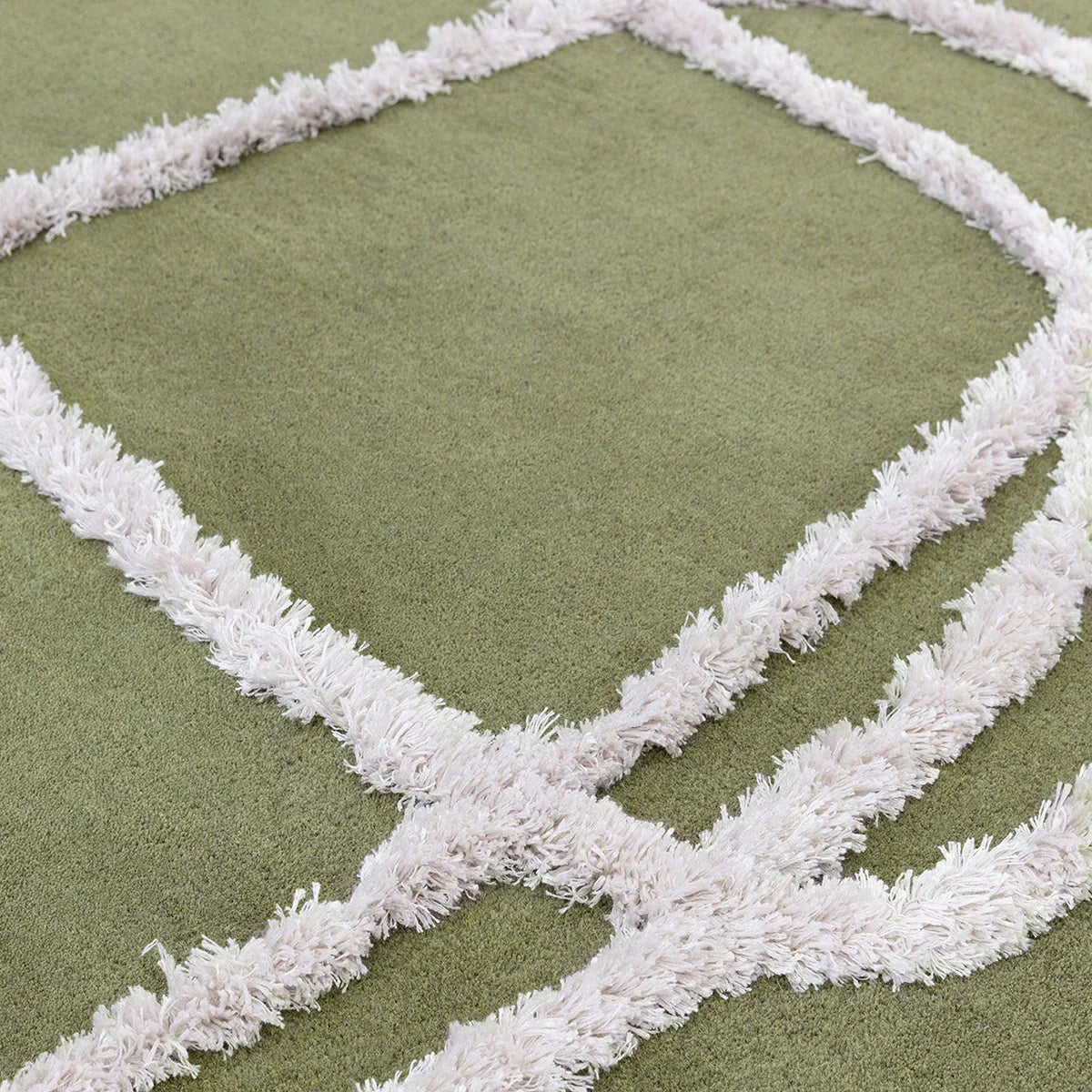 Asiatic Matrix Infinity Sage Rug featuring grid pattern in sage green and cream on sage green background, hand-tufted wool