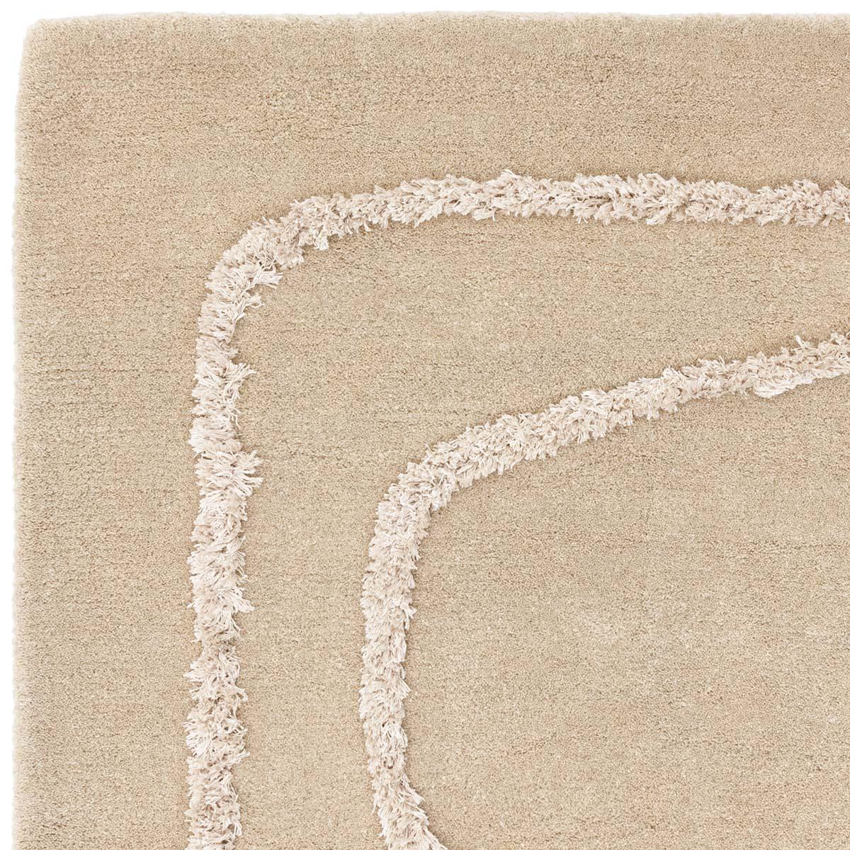 Asiatic Matrix Infinity Sand Designer Rug featuring abstract curved motif in cream on sand beige background, hand-tufted wool