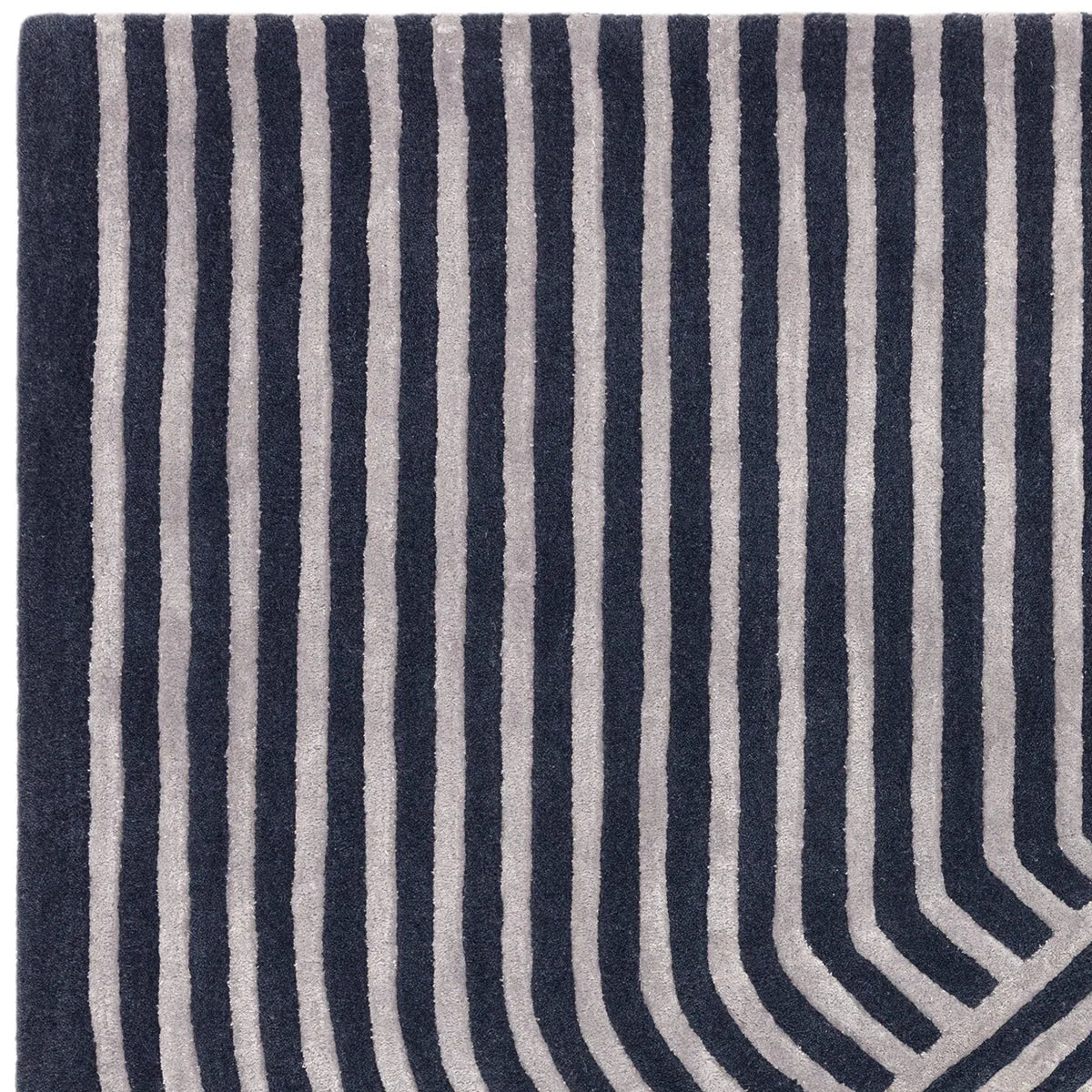 Asiatic Matrix Solstice Navy Rug featuring striped pattern in navy and light grey on dark navy, hand-tufted wool