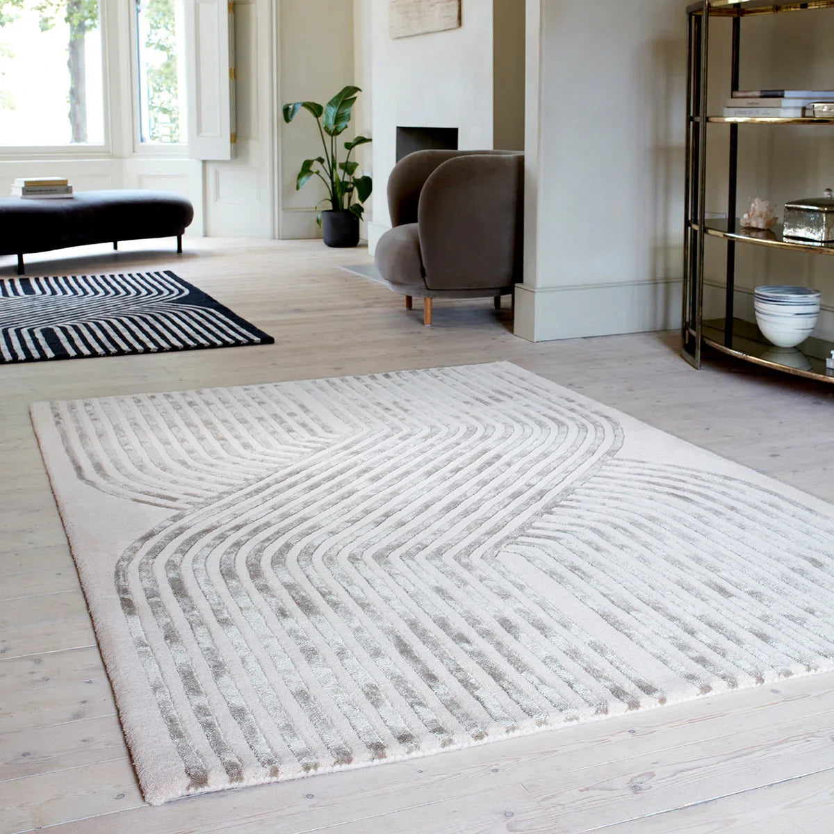 Asiatic Matrix Solsitice Ivory Designer Rug featuring abstract linear pattern in ivory, cream and taupe on cream background, machine-woven
