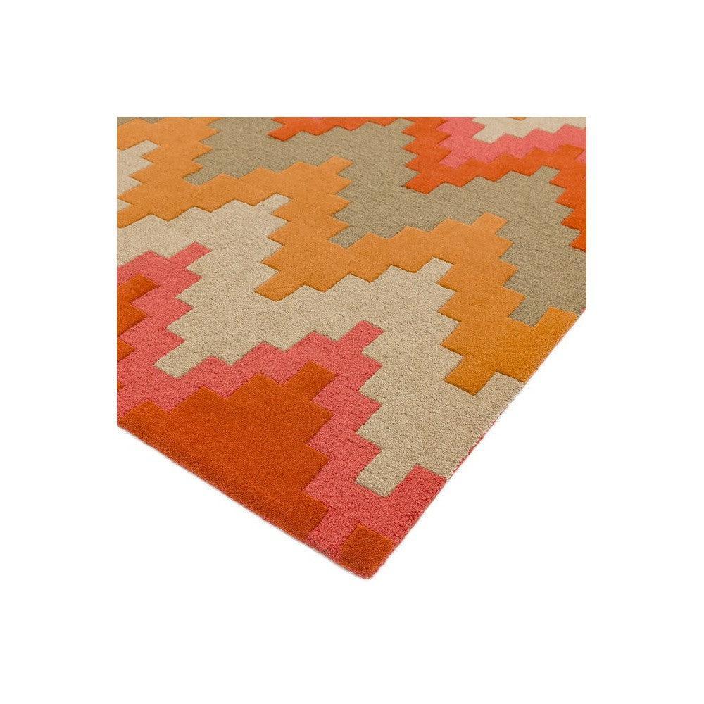 Asiatic Cuzzo Sienna Designer Rug featuring zigzag geometric pattern in sienna orange, pink, cream on beige background, hand-tufted wool