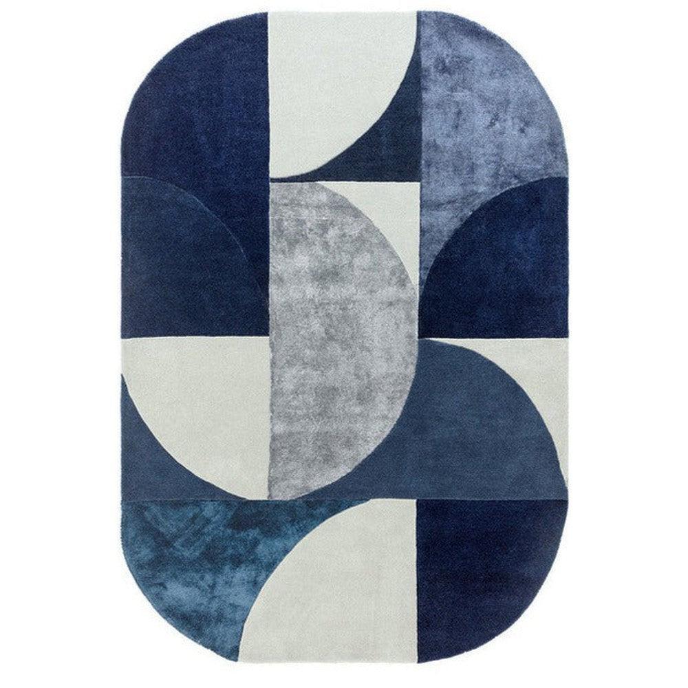 Asiatic Oval Indigo Designer Rug featuring geometric abstract pattern in navy indigo, light grey and cream on ivory background, hand-tufted wool