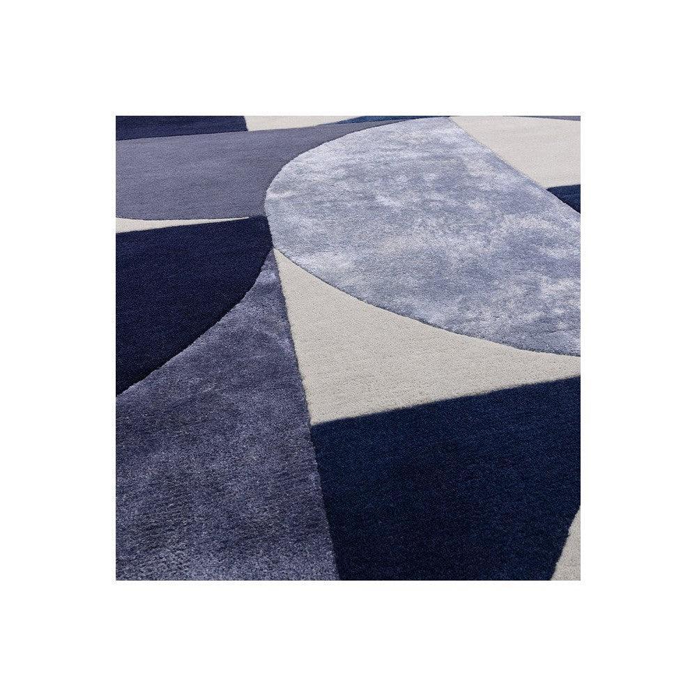 Asiatic Oval Indigo Designer Rug featuring abstract geometric pattern in indigo, navy, slate blue and beige on cream background, Asiatic London

