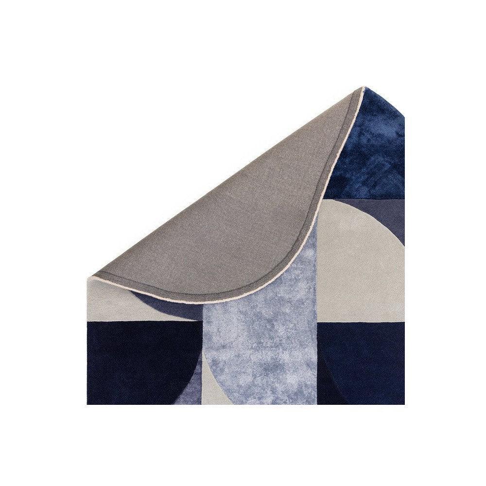 Asiatic Oval Indigo Designer Rug featuring abstract geometric blocks in navy, indigo, beige and grey on white, hand-tufted wool