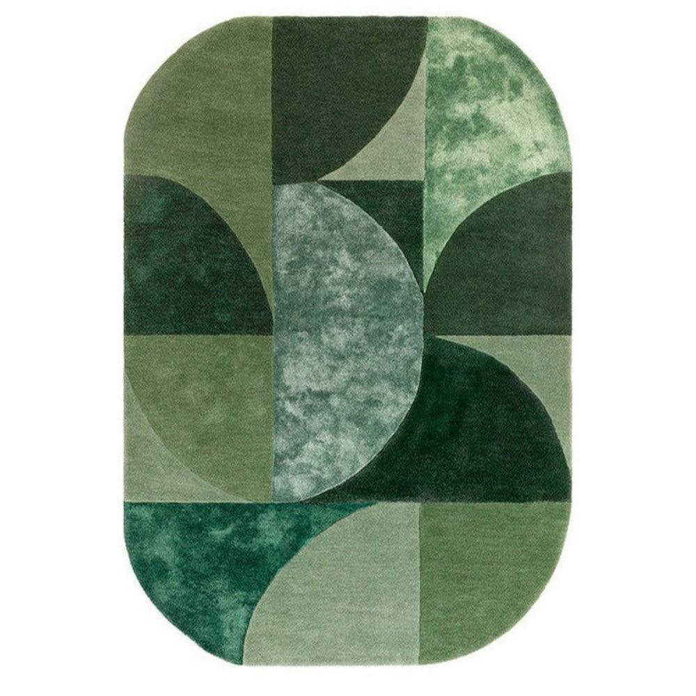 Asiatic Oval Forest Designer Rug featuring geometric patchwork in forest green, olive, sage on white background, hand-tufted wool