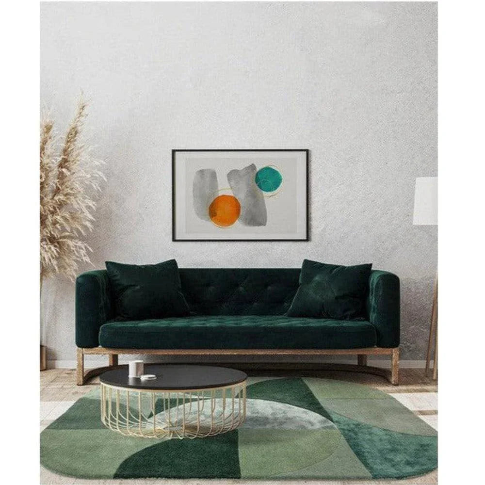 Asiatic Oval Forest Rug featuring abstract geometric pattern in forest green, emerald and sage on light beige background, hand-tufted wool