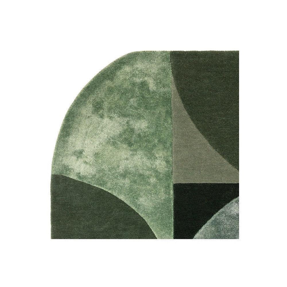 Asiatic Oval Forest Designer Rug featuring abstract geometric pattern in forest green, olive and charcoal on light background, hand-tufted wool