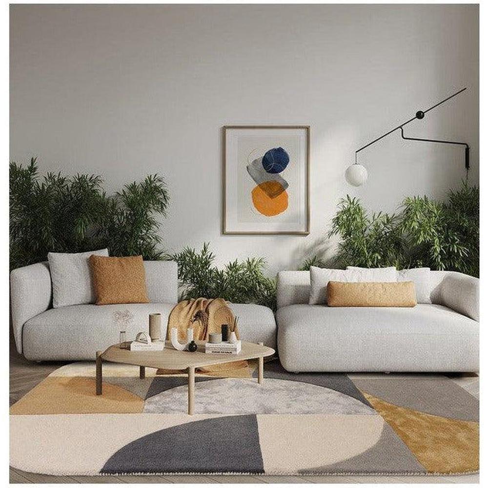 Asiatic Oval Sunset Designer Rug featuring geometric shapes in beige, grey, black, ochre on cream, hand-tufted wool
