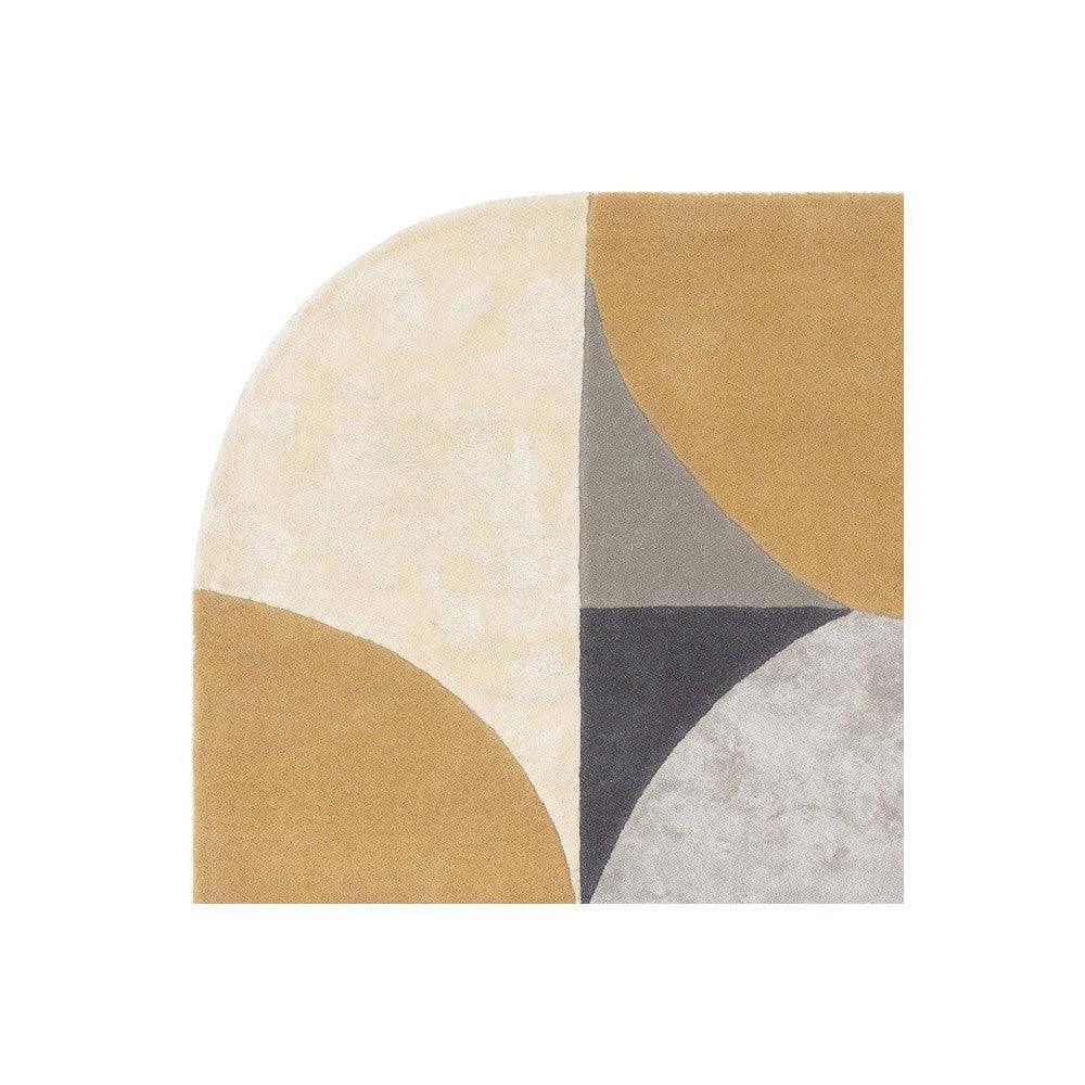 Asiatic Oval Sunset Designer Rug featuring abstract curved blocks in mustard, ivory, taupe and charcoal on light grey background, hand-tufted wool