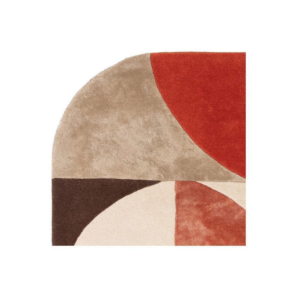 Asiatic Oval Spice Rug featuring geometric pattern in red, terracotta, beige, cream and brown on white background, hand-tufted wool