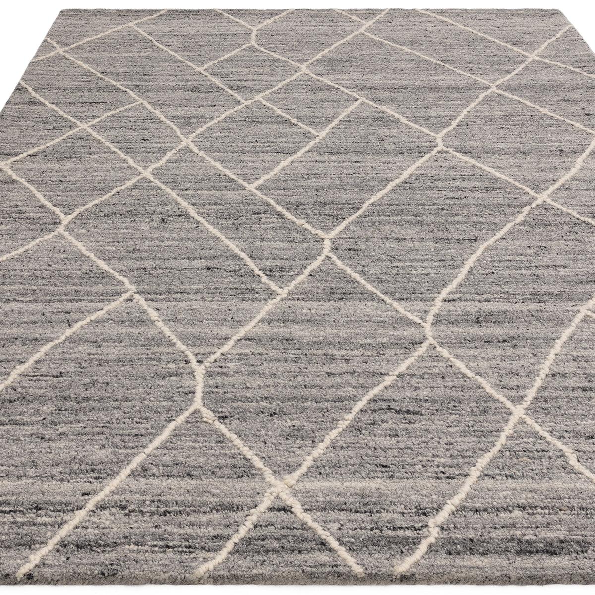 Asiatic Noah Charcoal Designer Rug featuring geometric diamond lattice in ivory on charcoal background, machine-made polypropylene