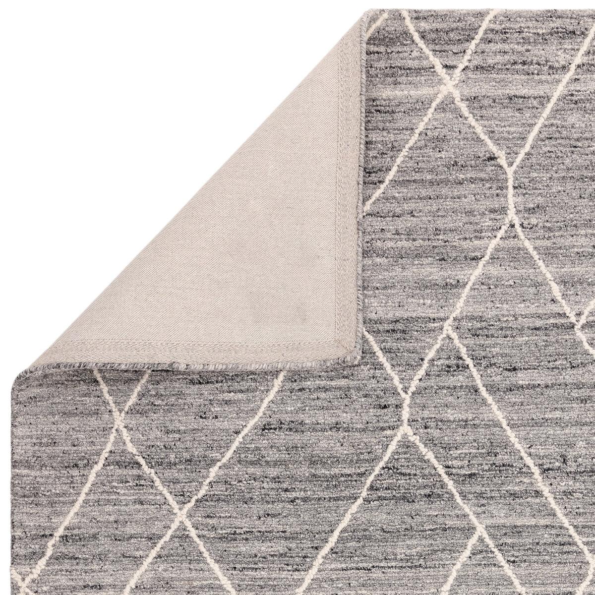 Asiatic Noah Charcoal Rug featuring geometric lattice pattern in charcoal grey and ivory on light beige backing, machine-woven wool