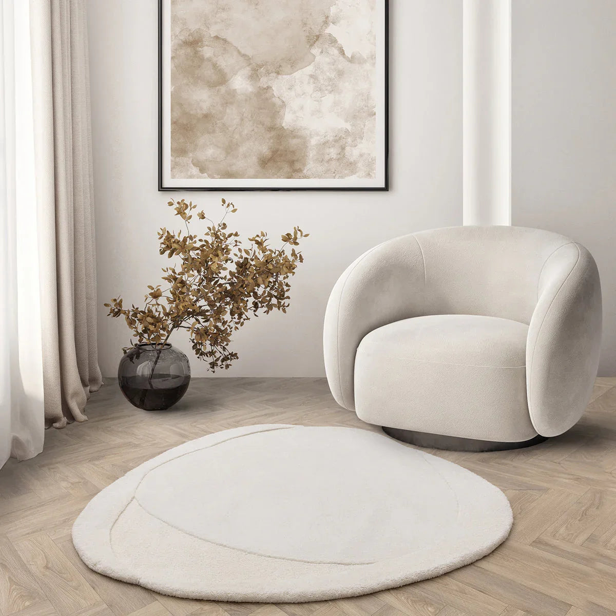 Asiatic Olsen Ridge Designer Rug featuring circular minimalist pattern in ivory, cream and beige on pale background, hand-tufted wool