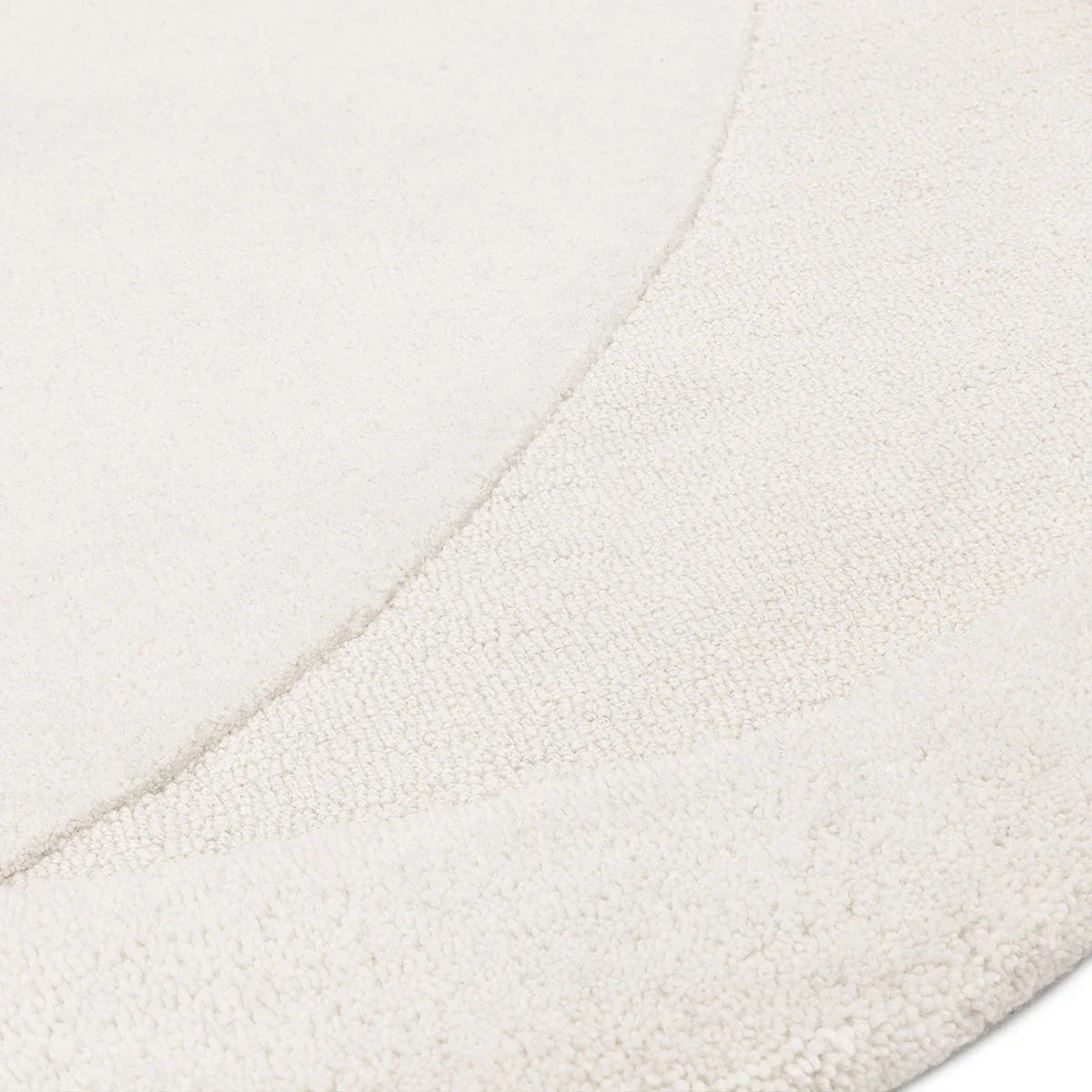 Asiatic Olsen Ridge Designer Rug featuring curved ridge texture in ivory and cream on a warm ivory background, hand-tufted wool