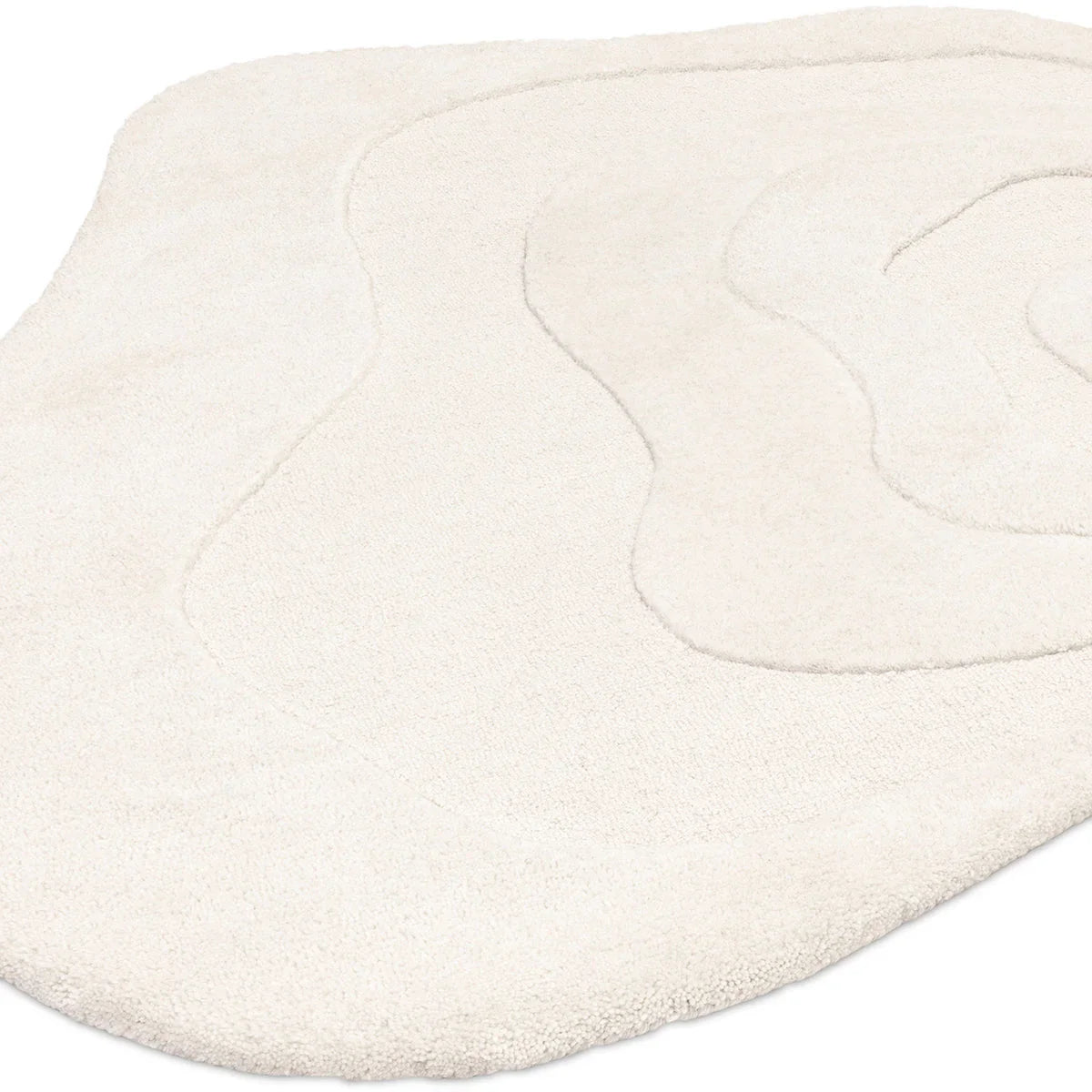Asiatic Olsen Surge Designer Rug featuring abstract wave pattern in ivory and cream on white, hand-tufted wool