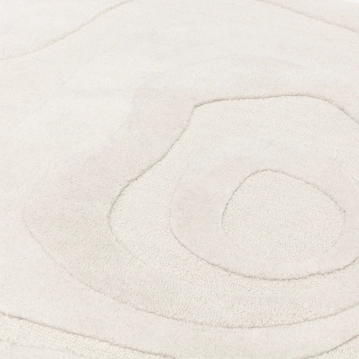 Asiatic Olsen Surge Designer Rug featuring abstract swirl pattern in ivory, bone and pale taupe on cream, hand-tufted wool