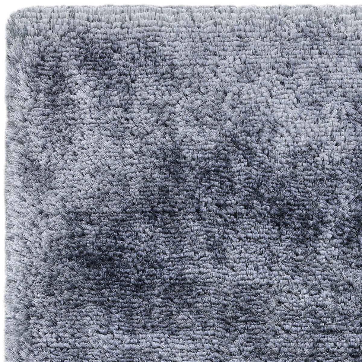 Asiatic Plush Airforce Blue Designer Rug featuring plush texture in airforce blue on grey-blue background, hand-tufted wool