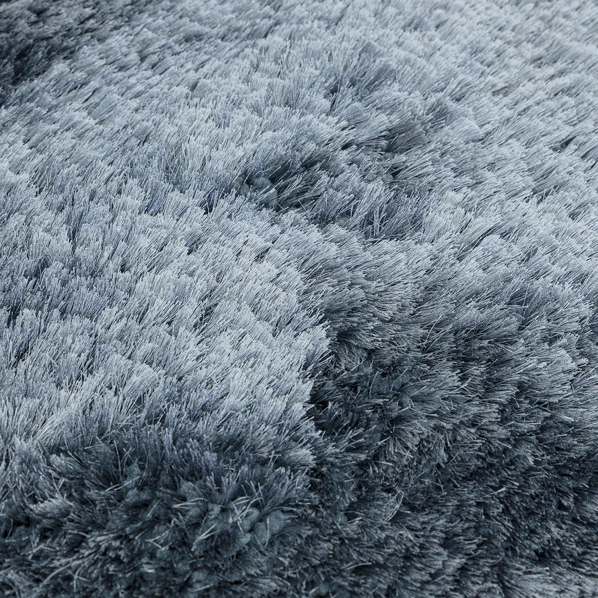 Asiatic Plush Airforce Blue Rug featuring plush shag in airforce blue, steel blue and grey on blue-grey background, hand-tufted wool