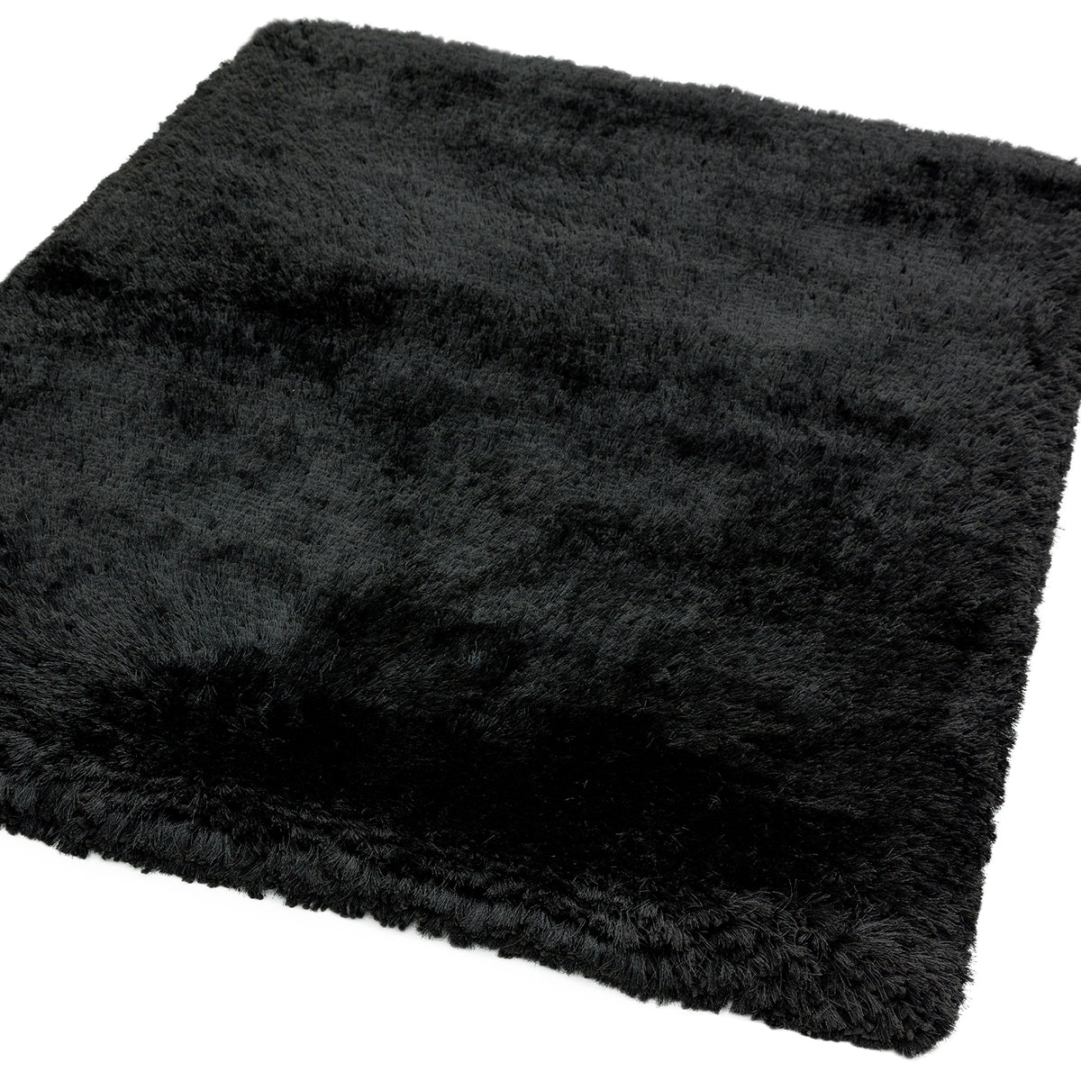 Black fluffy square rug on a white background