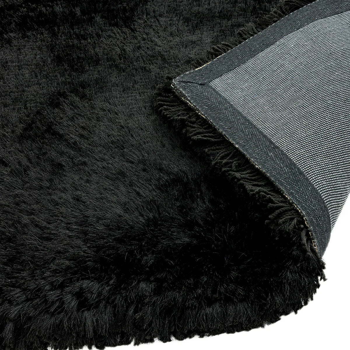 Asiatic Plush Black Designer Rug featuring dense black shag with grey backing, plush pile by Asiatic Carpets London