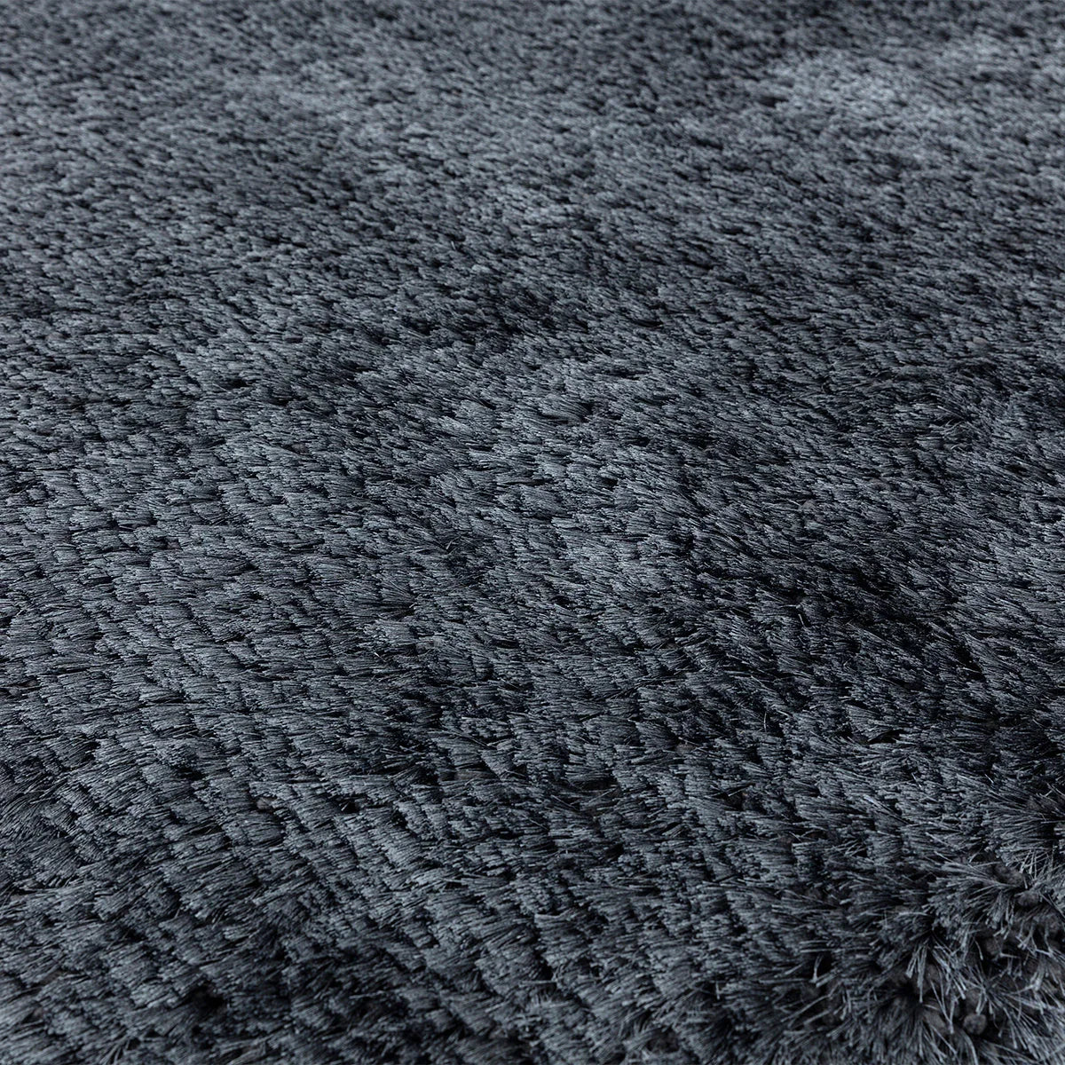 Asiatic Plush Navy Round Designer Rug featuring plush texture in navy blue on navy background, tufted synthetic fibre