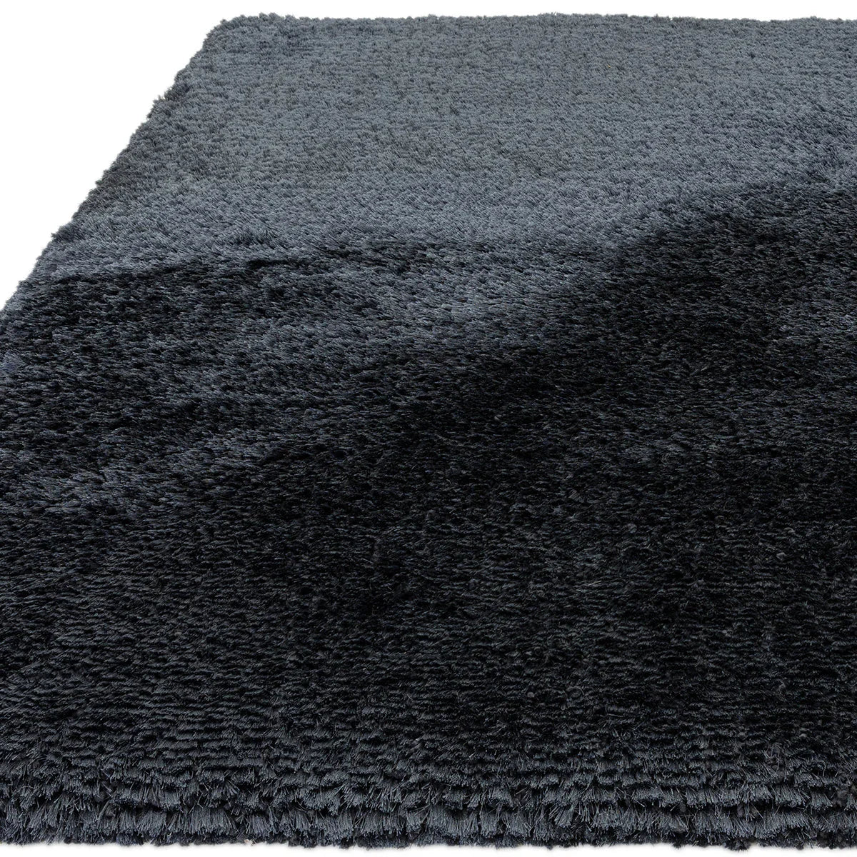 Asiatic Plush Navy Designer Rug featuring solid plush shag in navy and charcoal on white background, plush pile rug, unknown fibre