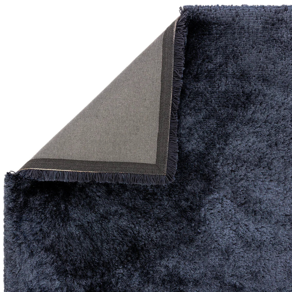 Asiatic Plush Navy Designer Rug featuring solid high-pile plush in navy blue with grey backing on hand-tufted wool