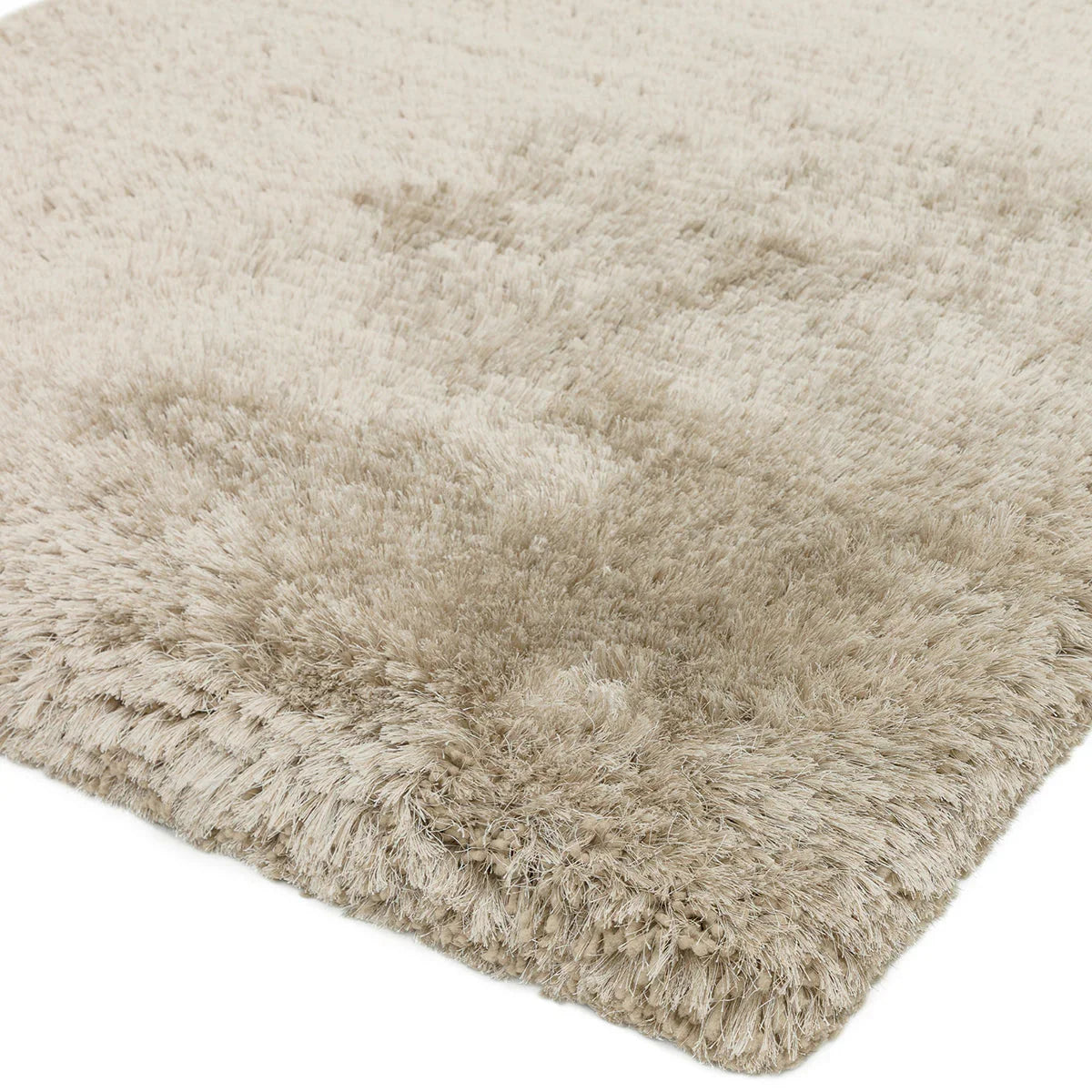 Asiatic Plush Pearl Designer Rug featuring shaggy plush texture in pearl beige on light cream background, machine-made polyester
