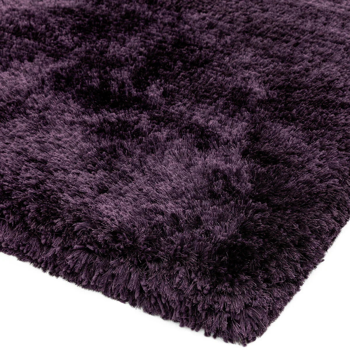 Asiatic Plush Purple Designer Rug featuring shaggy plush in deep purple, aubergine on solid purple background, machine-made nylon