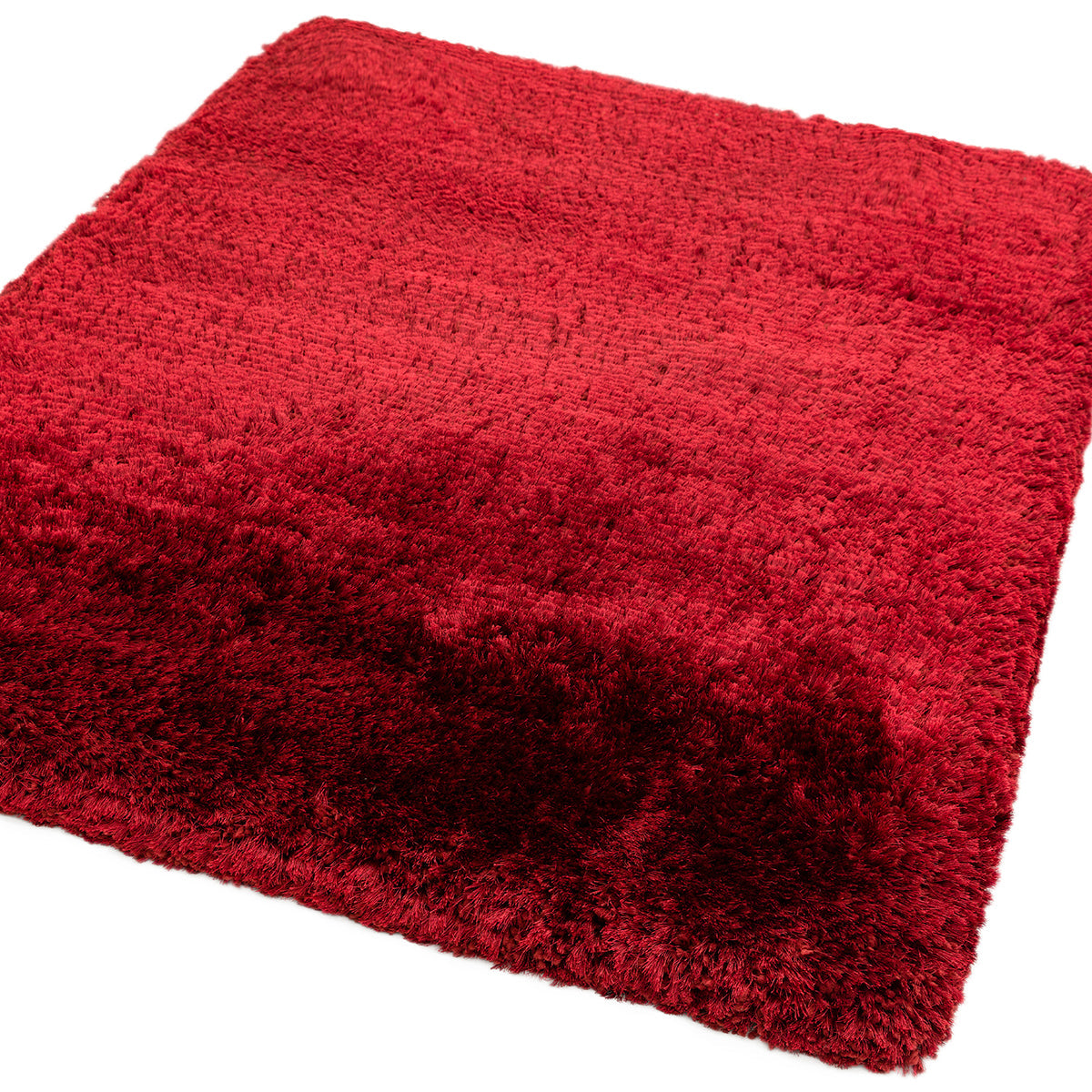 Red textured rug on a white background
