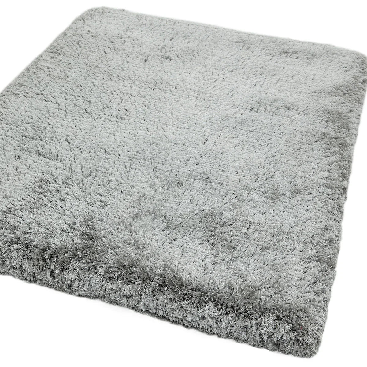 Asiatic Plush Silver Designer Rug featuring solid shag pattern in silver grey on light background, plush pile