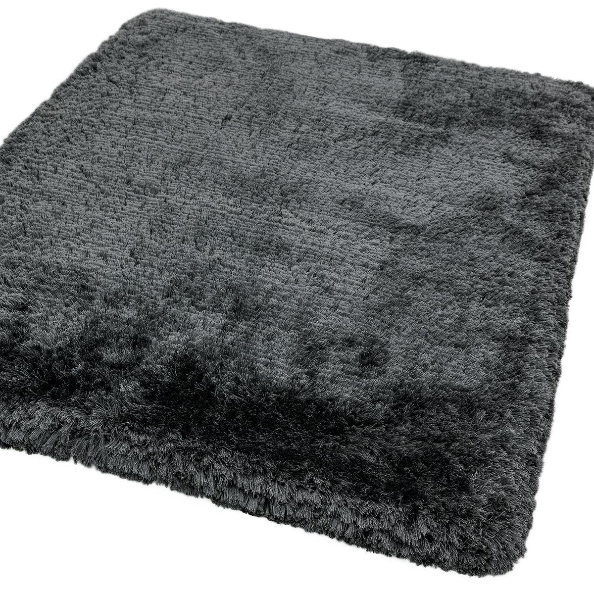 Asiatic Plush Slate Designer Rug featuring solid shag in slate grey and charcoal on white background, plush construction, synthetic fibres