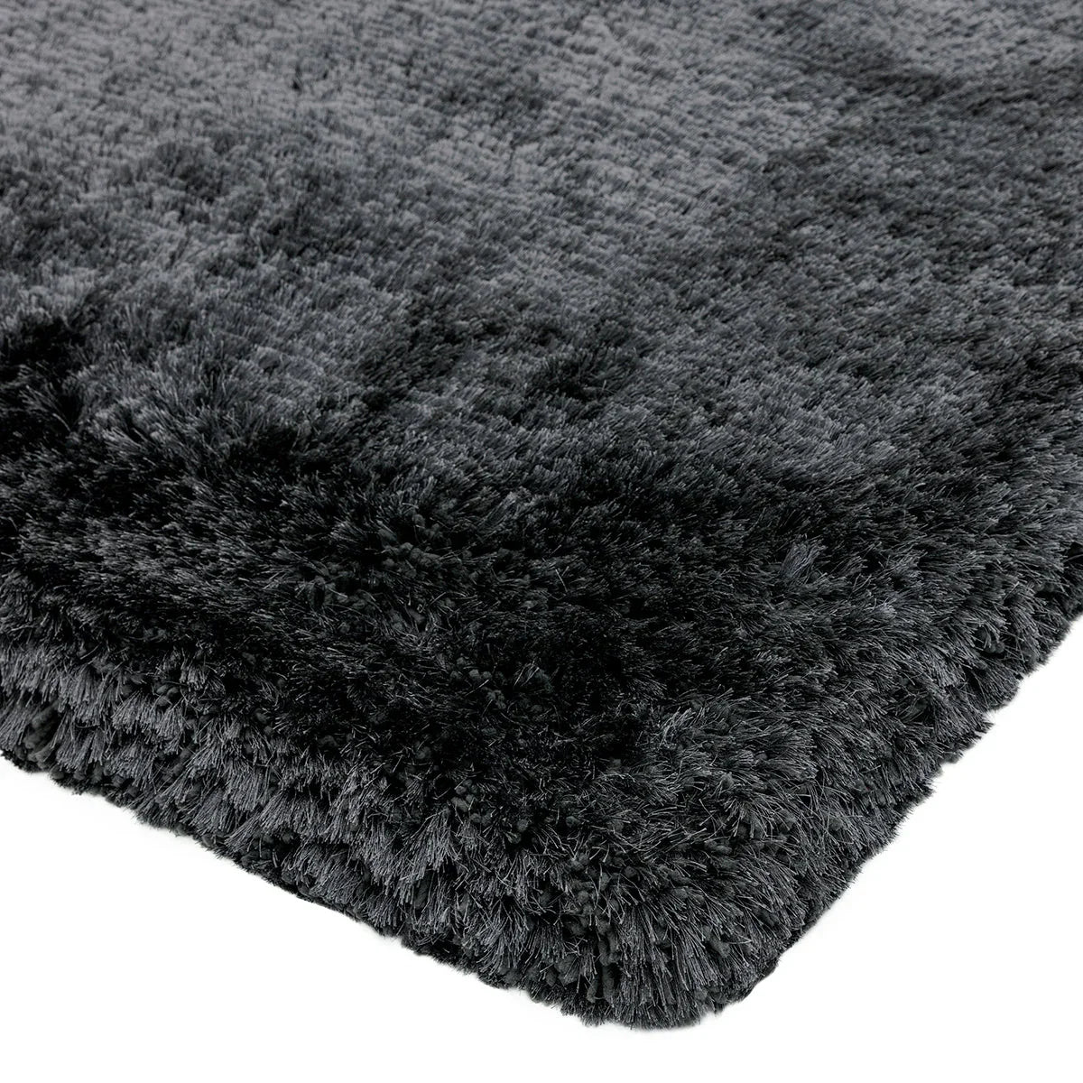 Asiatic Plush Slate Designer Rug featuring shaggy plush pile in slate grey and charcoal on dark slate background, plush pile, synthetic fibers