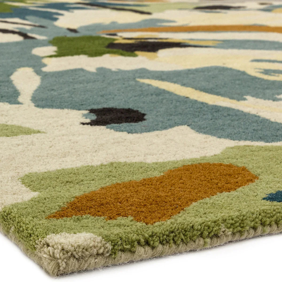 Asiatic Reef Floral Green Multi rug featuring abstract floral pattern in emerald, teal, cream on beige, hand-tufted wool