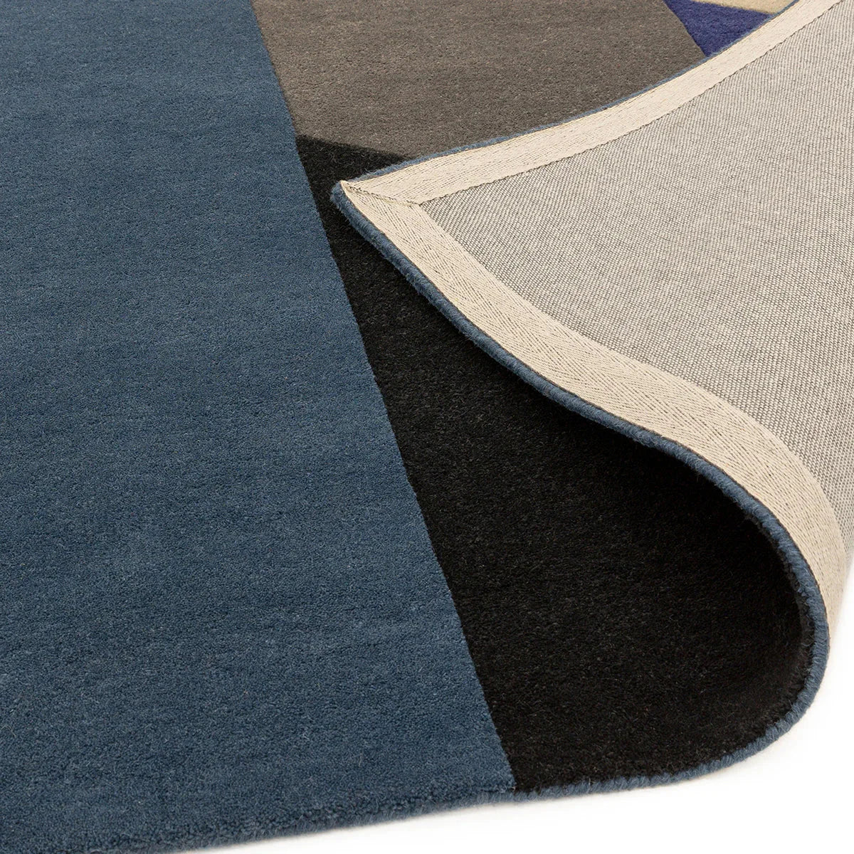 Asiatic Reef 13 Big Geo Blue Rug featuring geometric pattern in navy, cobalt, charcoal and cream on deep blue background, hand-tufted wool