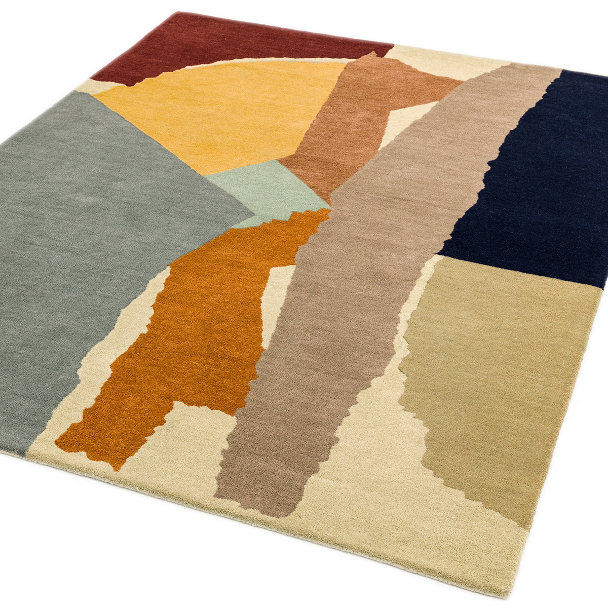 Multicolored geometric patterned rug on a white background