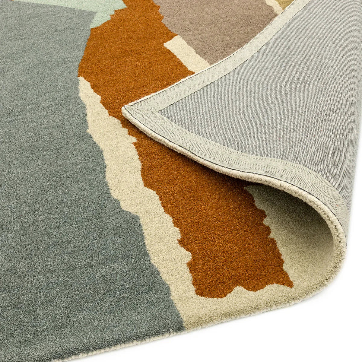 Asiatic Reef Abstract Multi Designer Rug featuring abstract pattern in olive grey, rust ochre and cream on pale beige background, hand-tufted wool