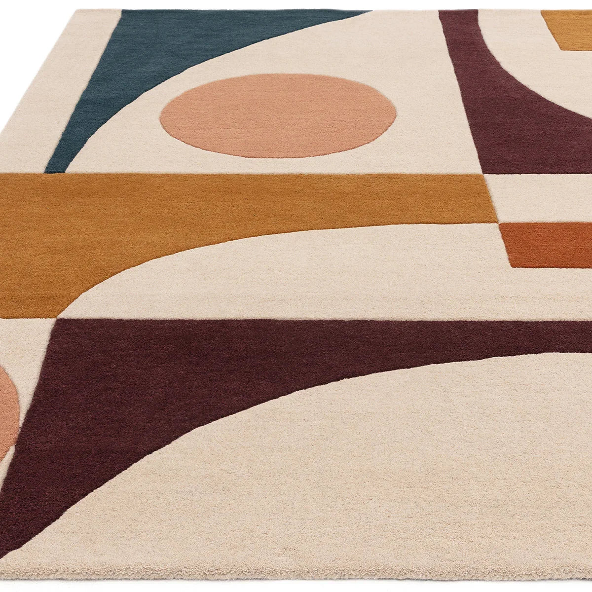Asiatic Reef Connect Multi Rug featuring abstract geometric pattern in cream, navy, teal, mustard and rust on beige backdrop, hand-tufted wool