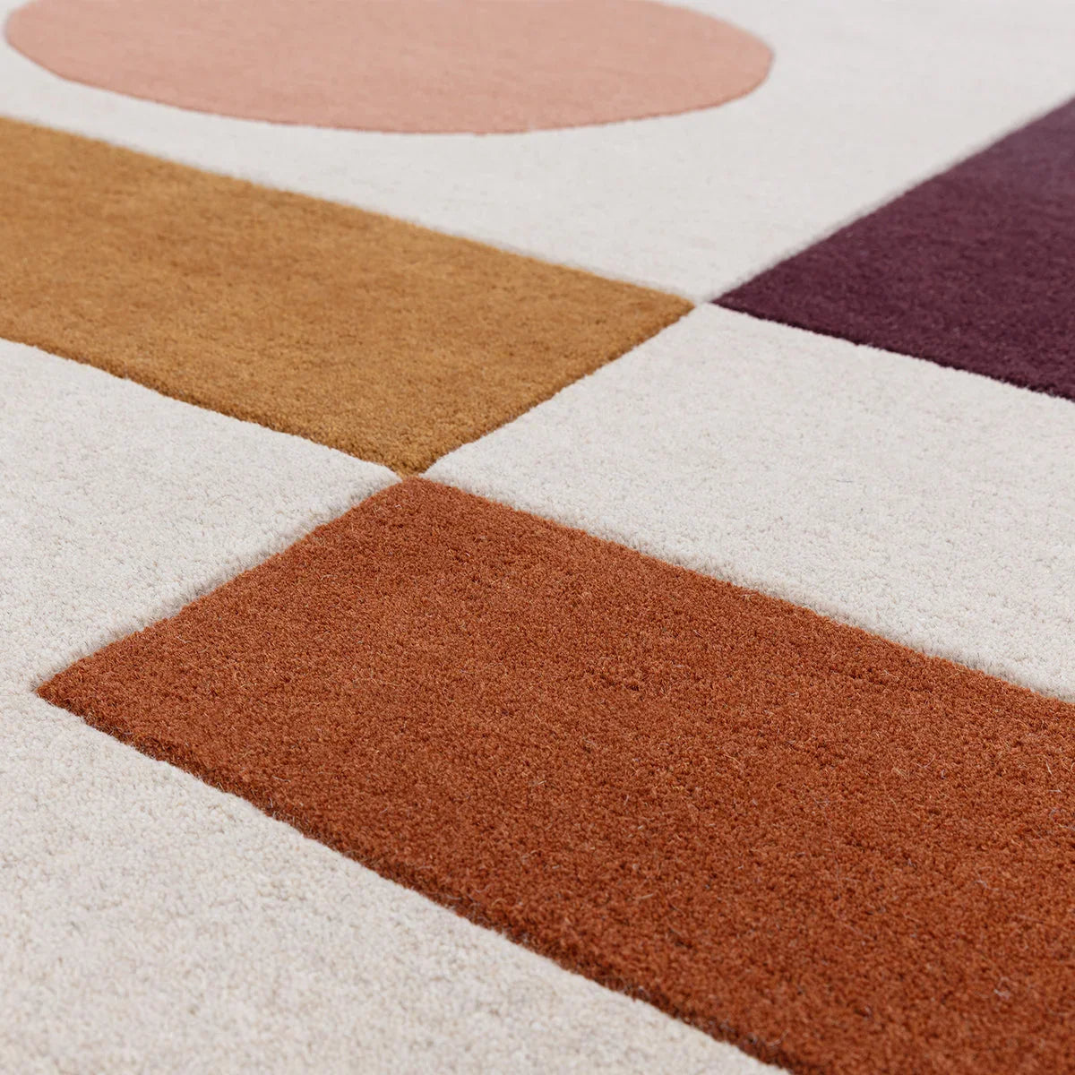 Asiatic Reef Connect Multi rug featuring geometric blocks in peach, apricot, mustard, rust and burgundy on ivory, hand-tufted wool
