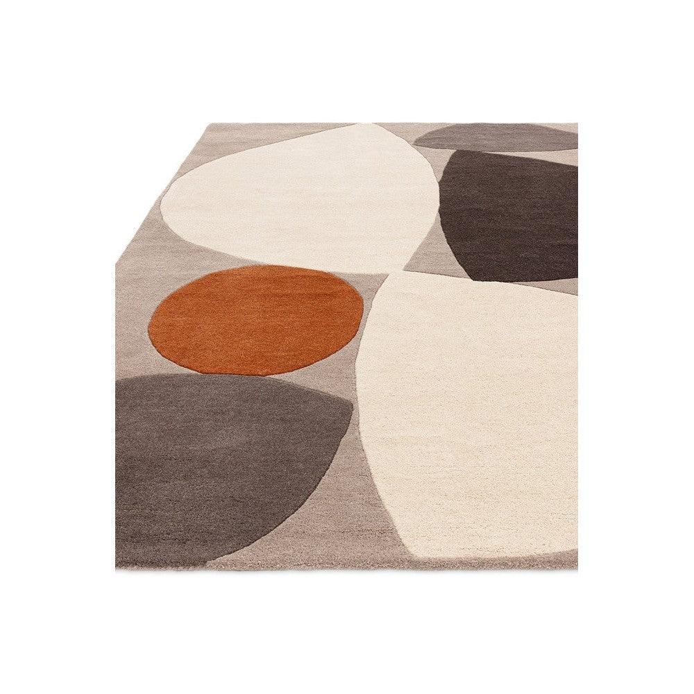 Asiatic Mid Century Grey Designer Rug featuring abstract circular pattern in cream, beige, taupe, charcoal and burnt orange on grey background, hand-tufted wool