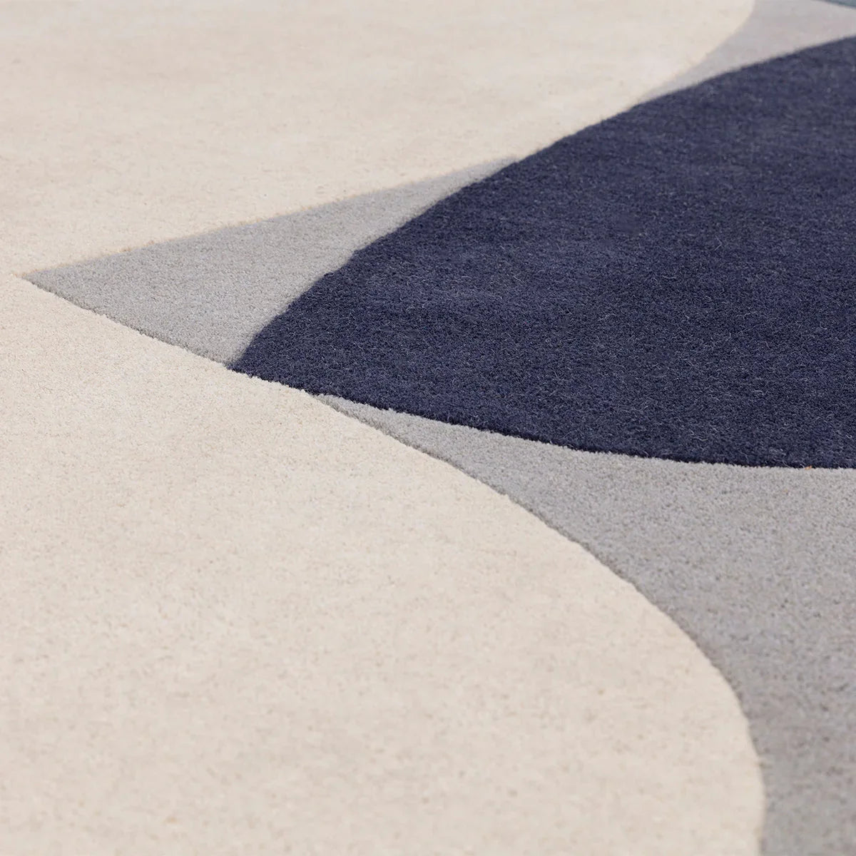 Asiatic Reef 25 Mid Century Teal Designer Rug featuring abstract reef pattern in teal, navy, grey and cream on cream background, hand-tufted wool